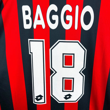 Close-up of sublimated Baggio 18 name-set on AC Milan 1996-1997 Lotto home vintage football jersey. Red and black stripes.