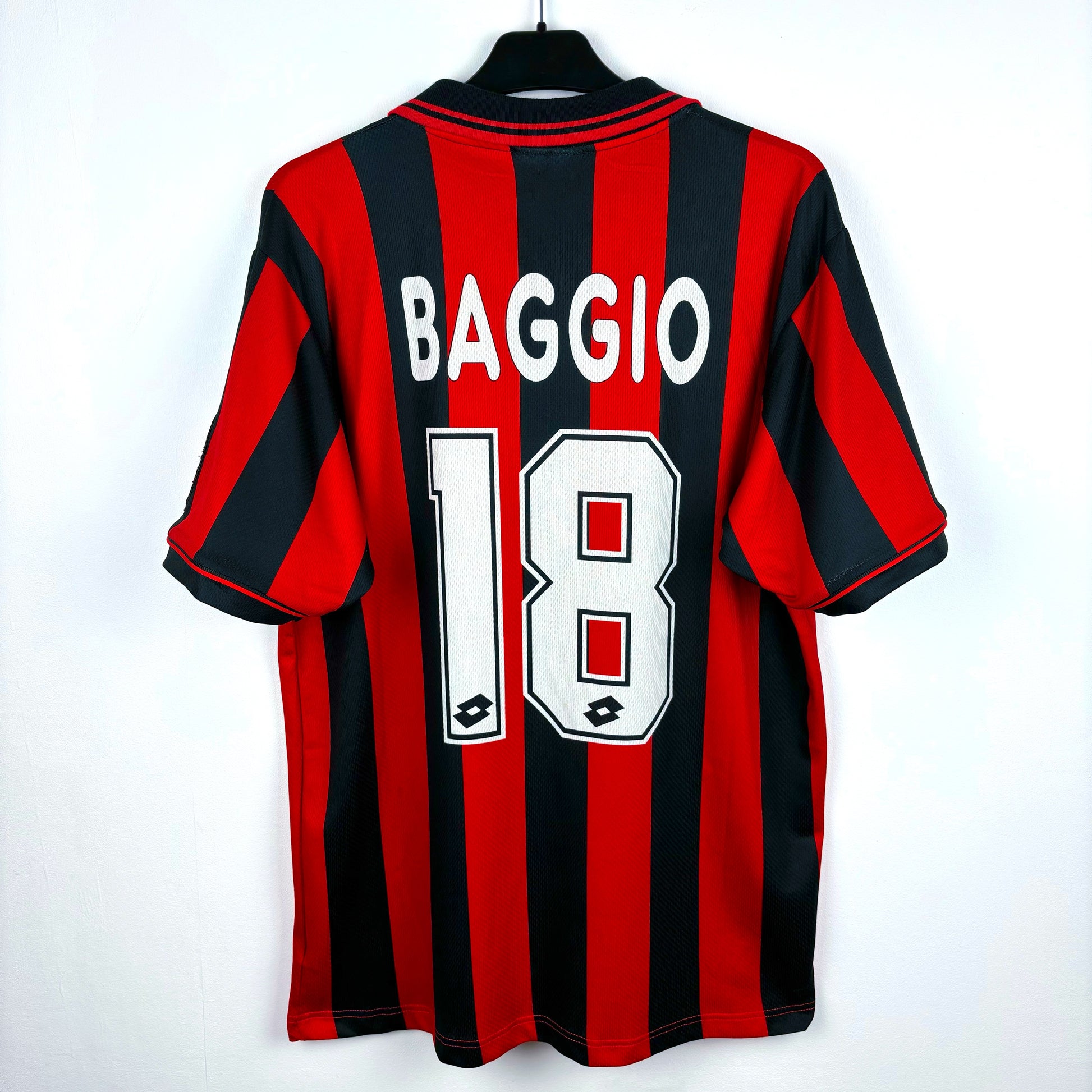 AC Milan 1996-1997 Lotto home vintage football shirt. Red and black stripes with sublimated Baggio nameset.