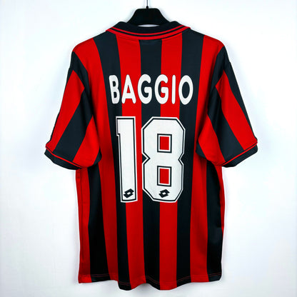 AC Milan 1996-1997 Lotto home vintage football shirt. Red and black stripes with sublimated Baggio nameset.