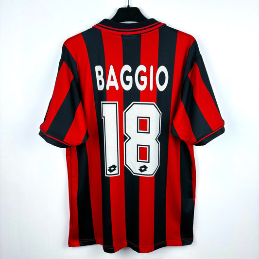 AC Milan 1996-1997 Lotto home vintage football shirt. Red and black stripes with sublimated Baggio nameset.