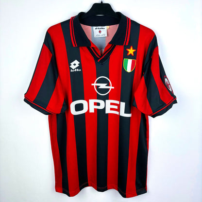 Front of AC Milan 1996-1997 Lotto home classic football jersey. Red and black stripes with OPEL sponsor.