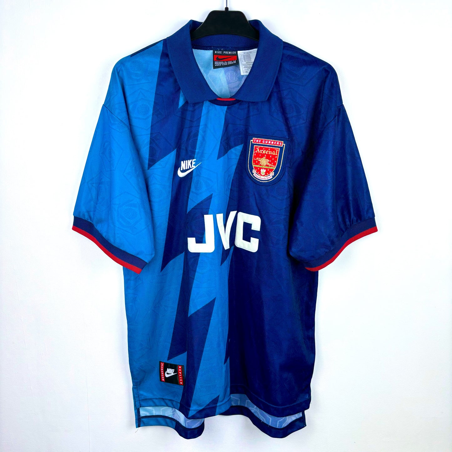 Arsenal 1995-1996 Nike away vintage football shirt. Two-tone navy and blue body with lightning bolt pattern. JVC sponsor.