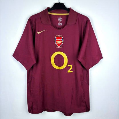 Front view of Arsenal 2005-2006 Nike home classic football shirt. Redcurrant shirt with O2 sponsor in gold.