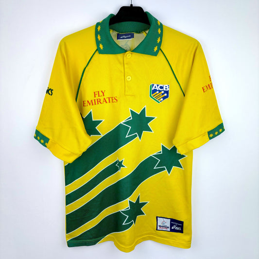 Vintage Australia 1999 World Cup cricket shirt by Asics, front view showing yellow and green star design with Fly Emirates sponsor logo