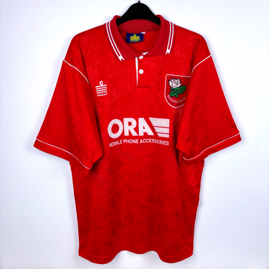 Barnsley 1996-1997 home classic football shirt produced by Admiral. Red body with white trim, features subliminal crest pattern.