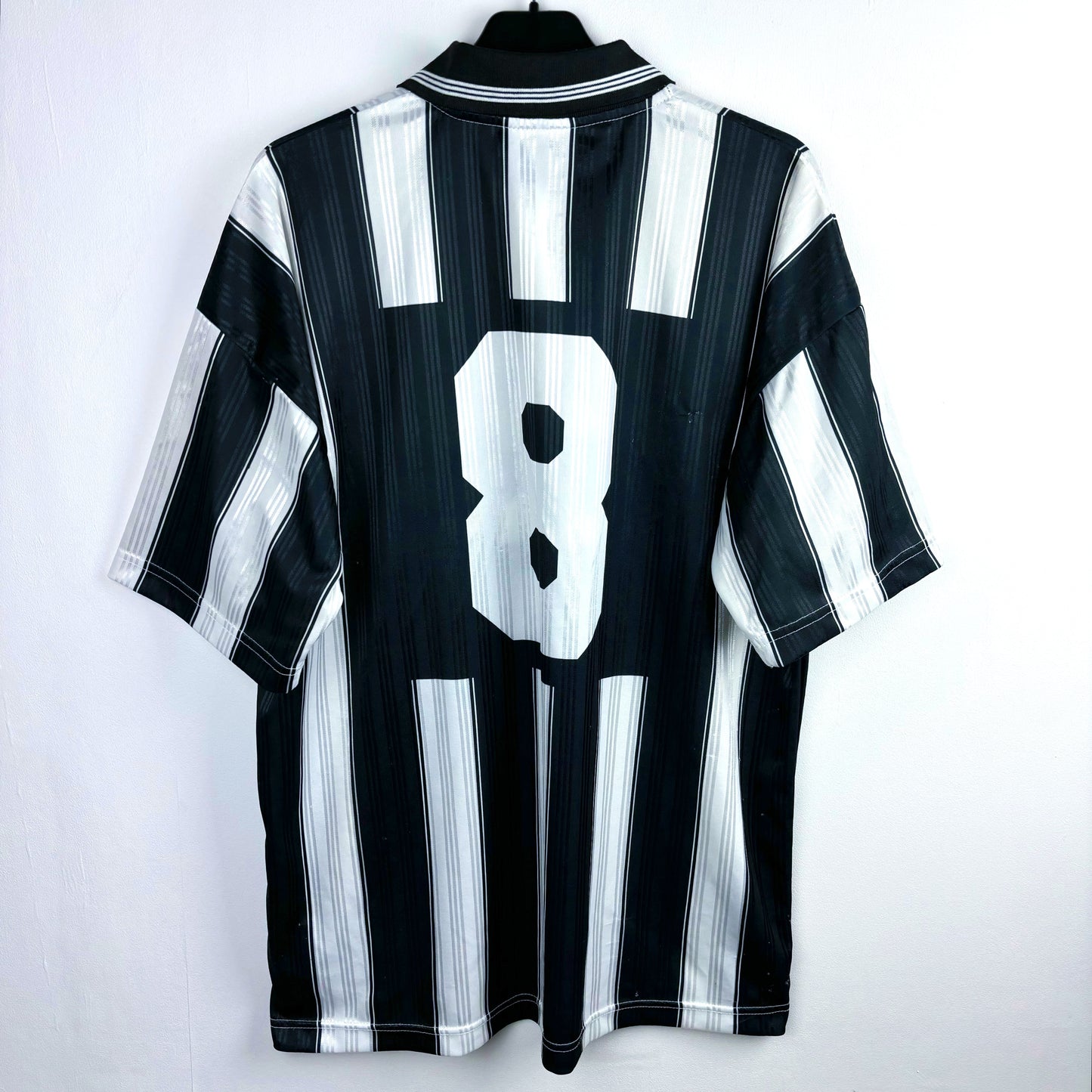 Rear of Besiktas 1996-1997 away adidas classic football shirt with black and white stripes.
