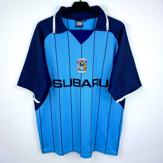 Front view of Coventry City 2003 home shirt – sky blue retro football jersey with Subaru sponsor