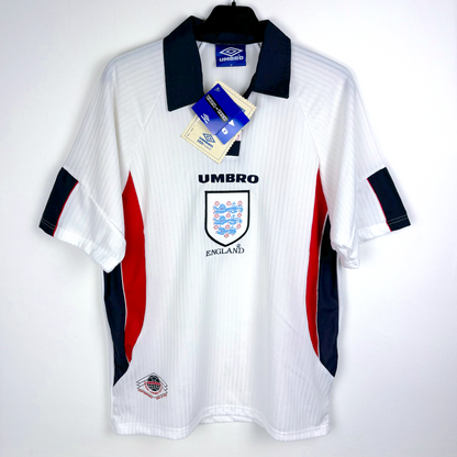 Front view of vintage England 1997-1999 home football shirt by Umbro as worn during the 1998 World Cup. White body with navy and red trim, brand new with tags,