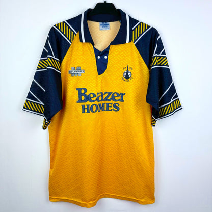 Falkirk 1994-1995 Matchwinner away vintage football shirt. Yellow body with navy sleeves. Beazer Homes sponsor.