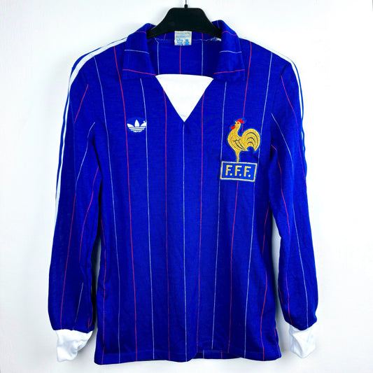 France 1980-1982 adidas vintage football shirt. Blue body with alternating red and white pinstripes.