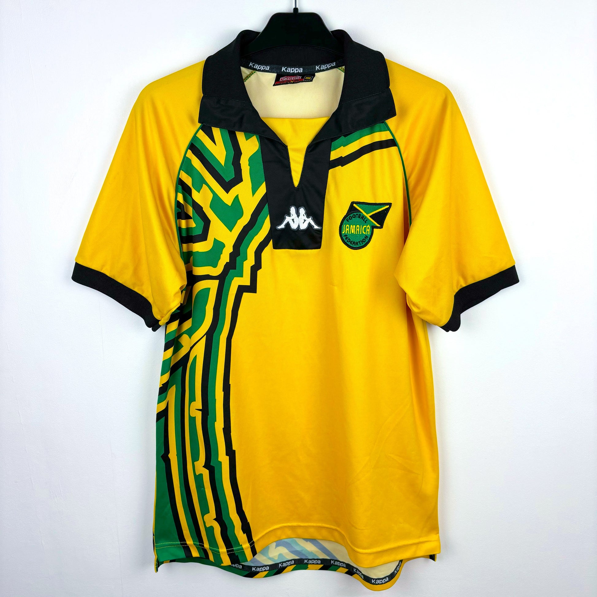 Jamaica 1998-1999 Kappa home vintage football shirt. Yellow body with black and green trim.