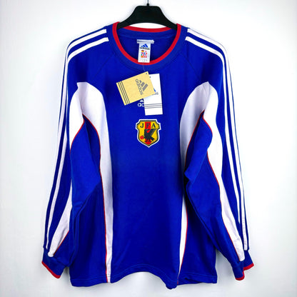 Japan 1999-2000 adidas vintage football sweatshirt. Blue body with white vertical swooshes and red trim. Brand new with tags attached. 