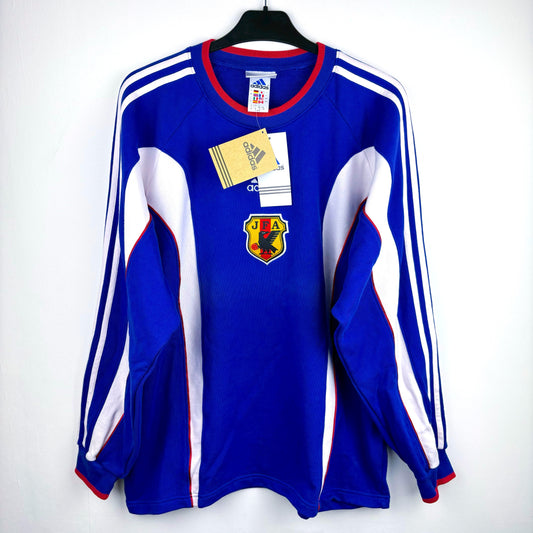Japan 1999-2000 adidas vintage football sweatshirt. Blue body with white vertical swooshes and red trim. Brand new with tags attached. 