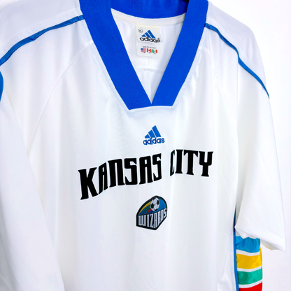 Side view of Kansas City 1997-1998 vintage football shirt amde by Adidas. White body featuring rainbow coloured side panels.