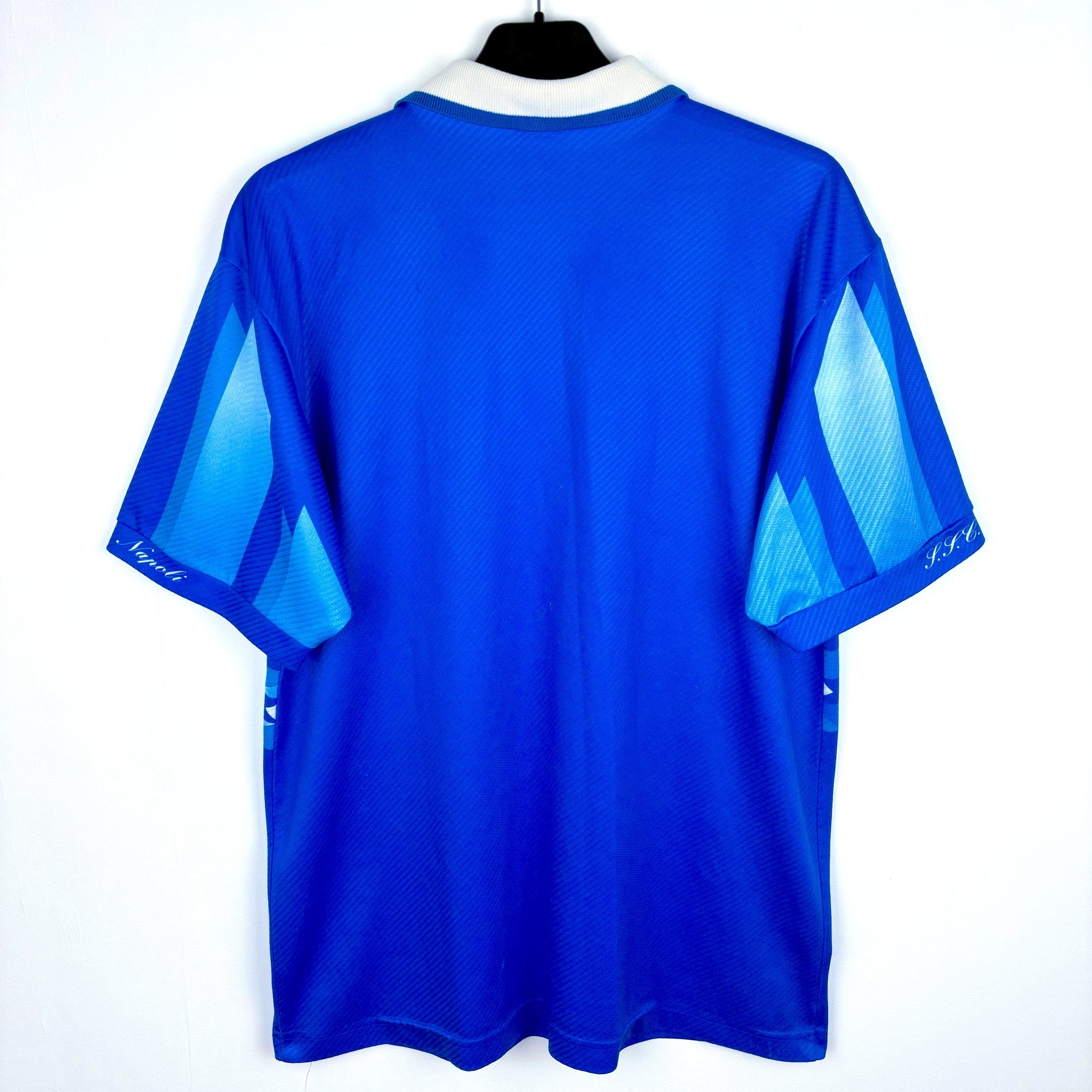 Rear view of Napoli 1996-1997 Lotto home vintage football shirt. Blue body with sublimated pattern. 