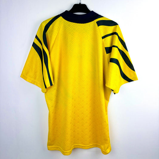Rear view of Preston North End 1992-1993 Matchwinner away classic football shirt red body and white sleeves. Yellow body with navy pattern.