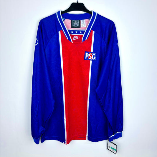 PSG 1994-1995 Nike home vintage football shirt. Long-sleeved blue body with central red vertical stripe and white trim.