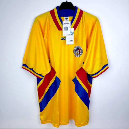 Romania 1994-1995 retro soccer jersey made by Adidas. Features attached swing tags and angled red/blue striped design