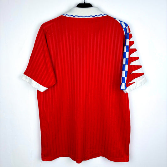 Reverse of Uruguay Ennerre 1992-1994 away classic football shirt. Red body with shoulder pattern.