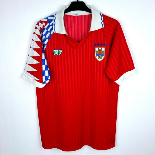 Uruguay Ennerre 1992-1994 away vintage football shirt. Red body with shoulder pattern.